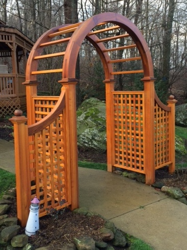 5 x 5 x 60 classic symmetrical natural cedar wooden arbor with square lattice sides and optional wings with posts and ball top post caps