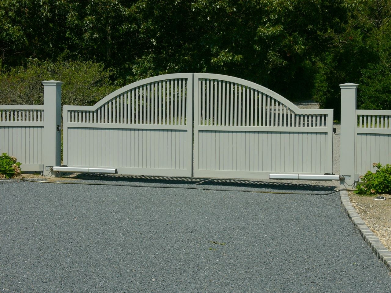 Estate Convex Cedar Driveway Gate with auto access controls
