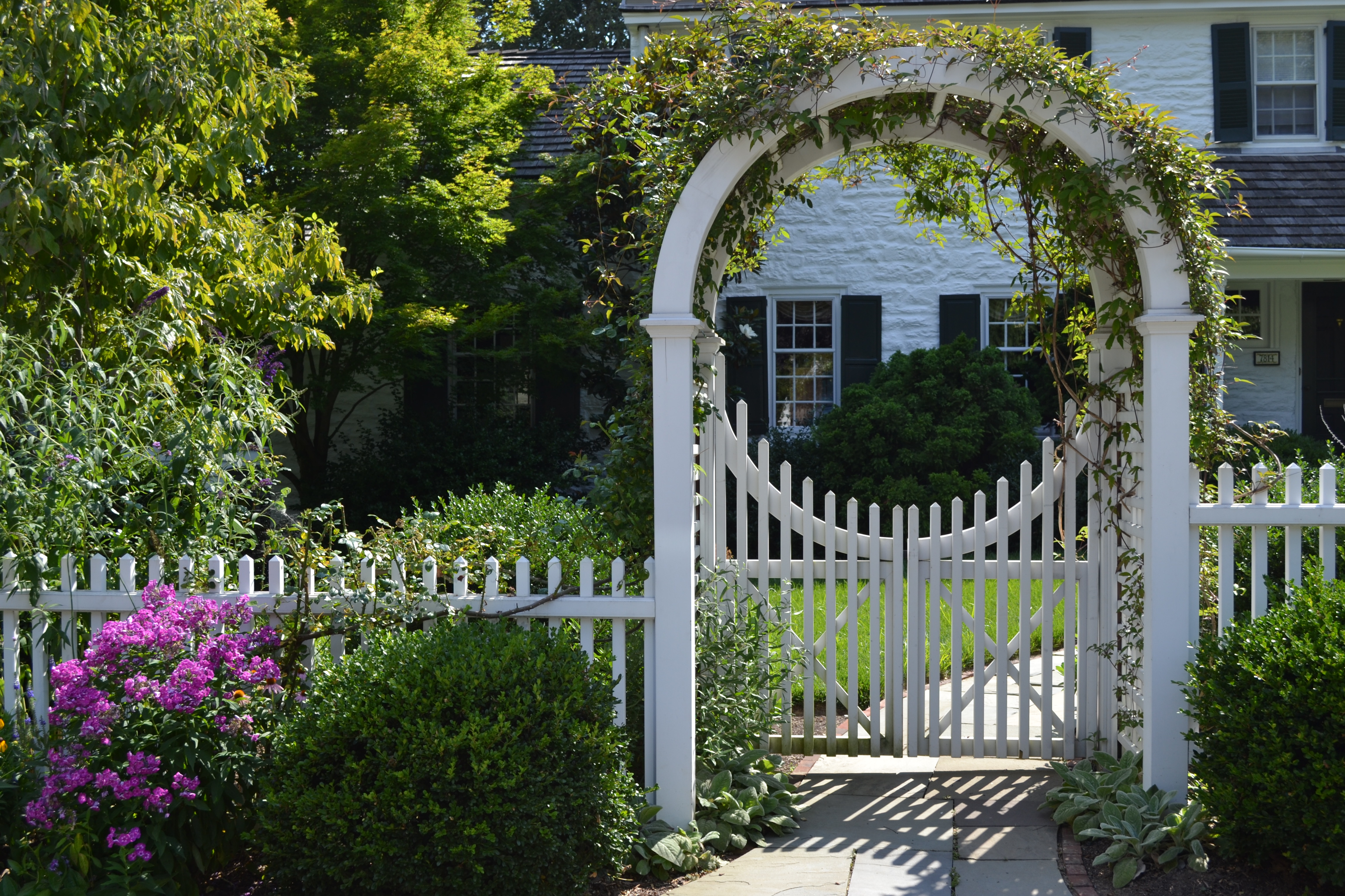 Entrance Arbor with picket gate and fence